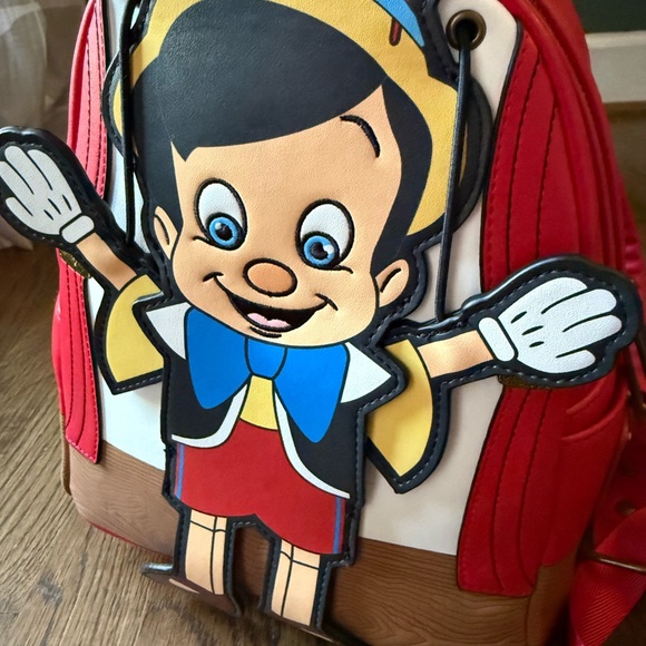 Red Pinocchio Backpack - Picture 2 of 4